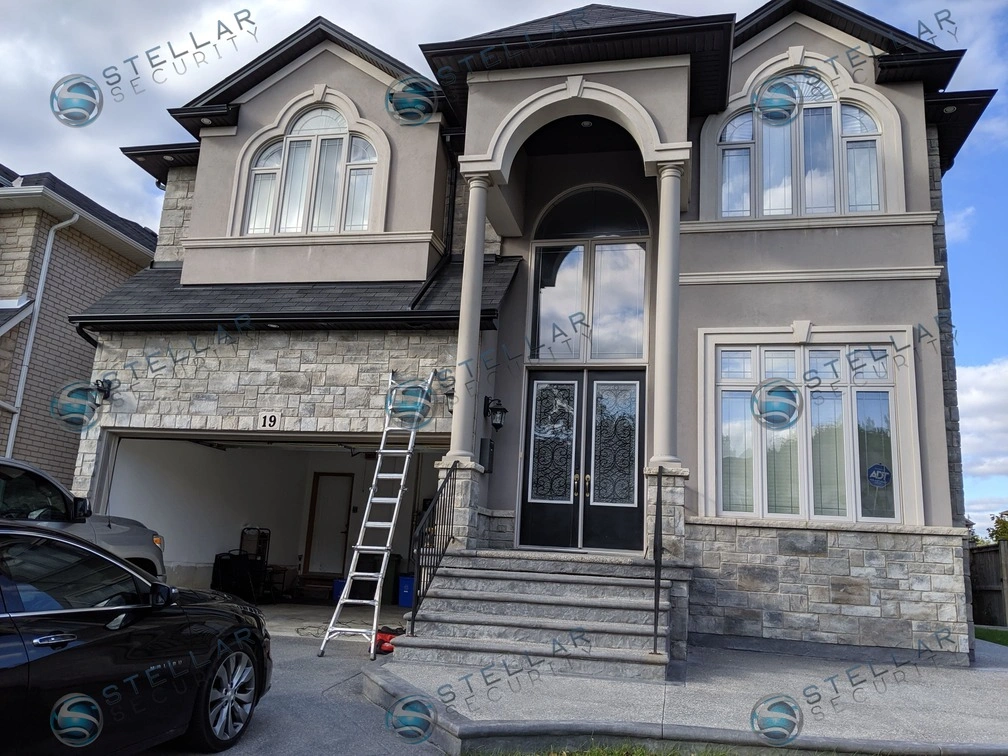 Full exterior view of luxury Toronto home with completed 4K security camera system