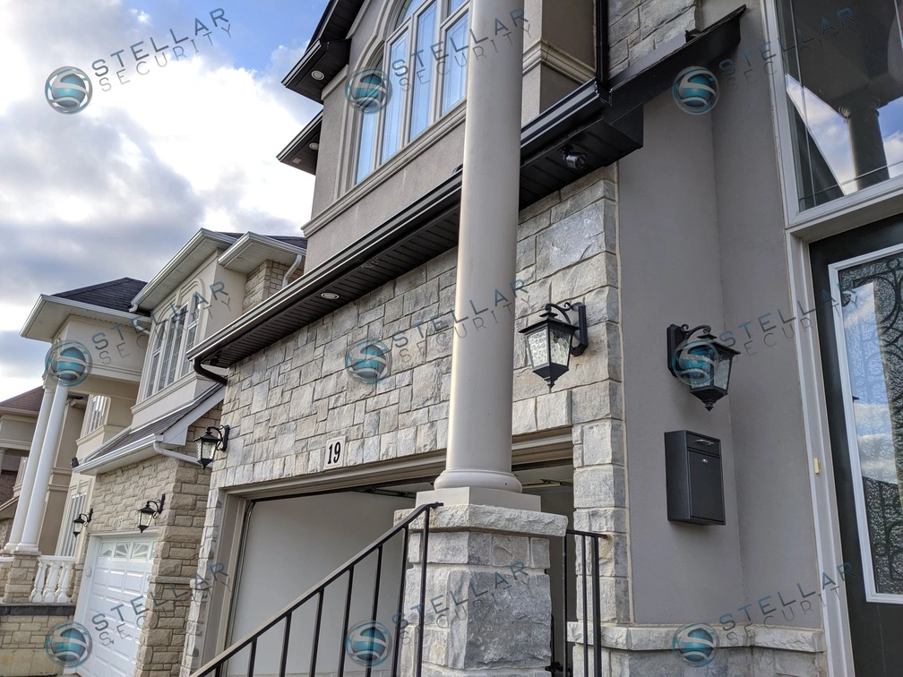 Front entrance view of Toronto residential property showing soffit security camera placement