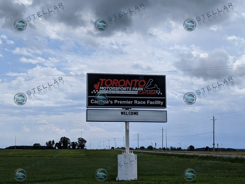 Toronto Motorsports Park entrance sign in Cayuga Ontario showcasing commercial security installation project.